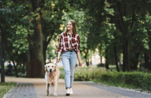 Calm dog on leash with owner at Boise park